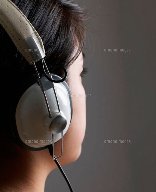 Woman Listening to Headphones
(c)clover/a.collectionRF