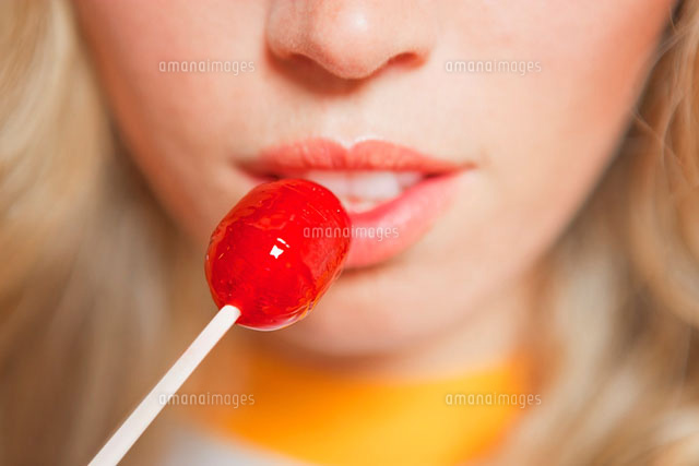 Close-up of Woman’s Face with Lolly Pop
(c)Radius Images