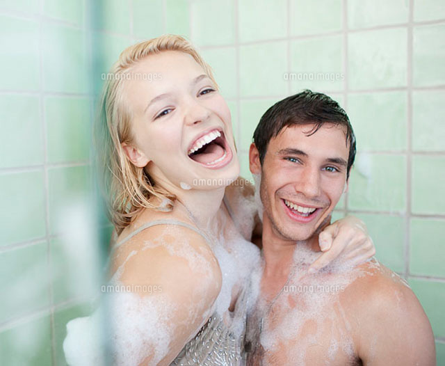 Couple In Bathtub Covered With Soap Suds11055011040