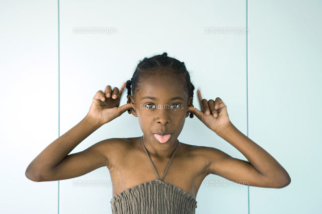 Girl sticking out tongue
(c)Sandro Di Carlo Darsa/Photo Alto