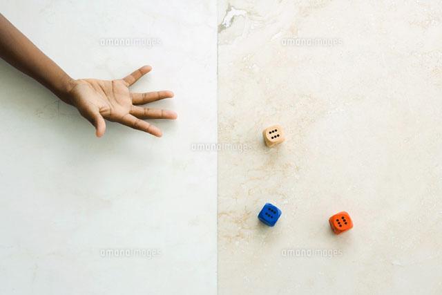 Child throwing dice of hand
(c)Sandro Di Carlo Darsa/Photo Alto