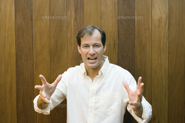 Man gesturing at camera with hands
(c)Sandro Di Carlo Darsa/Photo Alto