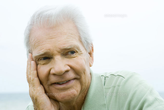 man with hand on cheek, smiling
(c)Sandro Di Carlo Darsa/Photo Alto