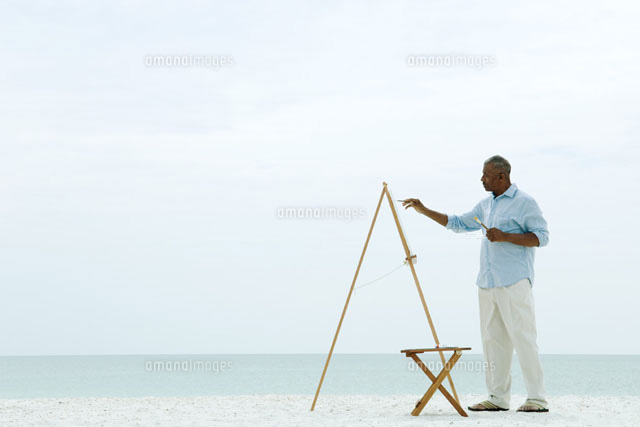 man painting canvas at the beach
(c)Eric Audras/Photo Alto