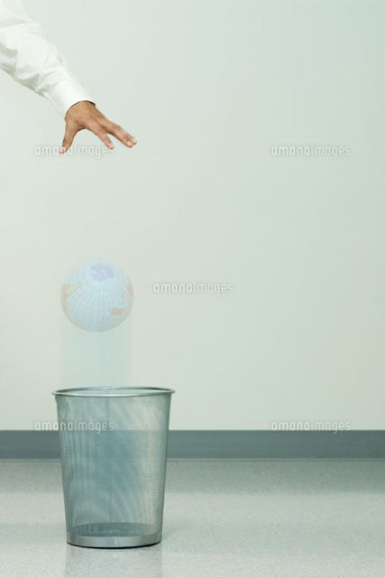 Businessman dropping globe
(c)Milena Boniek/Photo Alto