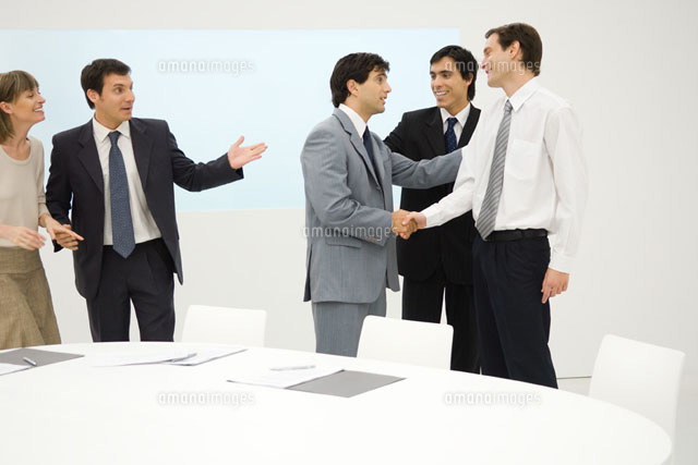 professionals standing beside table
(c)Eric Audras/Photo Alto