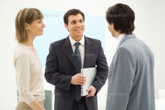 Three business associates standing
(c)Eric Audras/Photo Alto