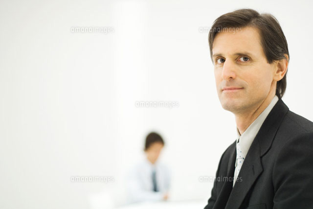 Businessman smiling at camera
(c)Eric Audras/Photo Alto