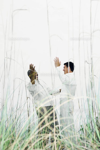 Two men greeting each other outdoors
(c)Laurence Mouton/Photo Alto