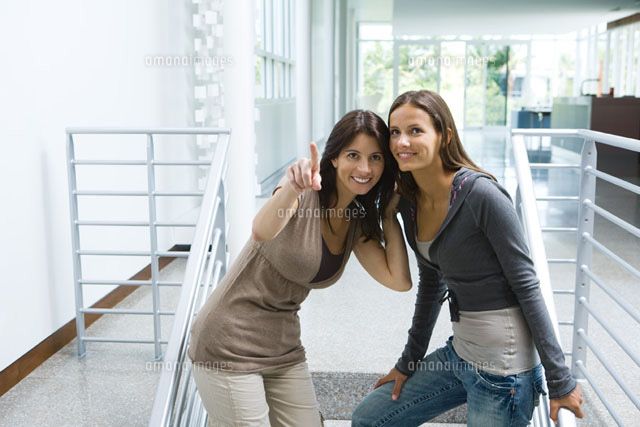 Woman standing on stairs with daughter
(c)Laurence Mouton/Photo Alto