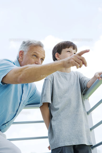 Grandfather & grandson standing
(c)Laurence Mouton/Photo Alto