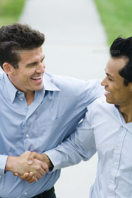 Two businessmen shaking hands
(c)Laurence Mouton/Photo Alto