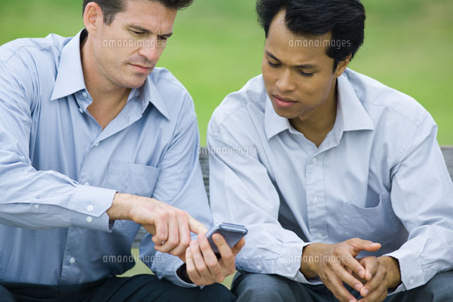 Two businessmen sitting together
(c)Laurence Mouton/Photo Alto