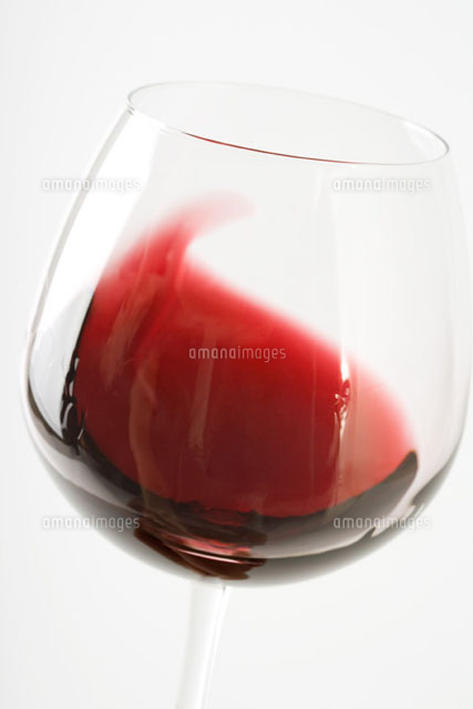 Red wine being swirled in glass
(c)Laurence Mouton/PhotoAlto
