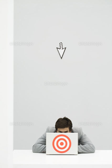 Computer cursor pointing at businessman hiding behind target
(c)Ale Ventura/PhotoAlto
