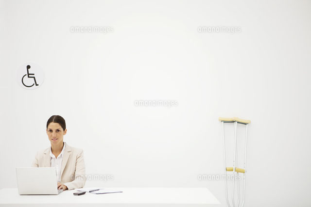Professional woman working in office, smiling at camera
(c)Ale Ventura/PhotoAlto