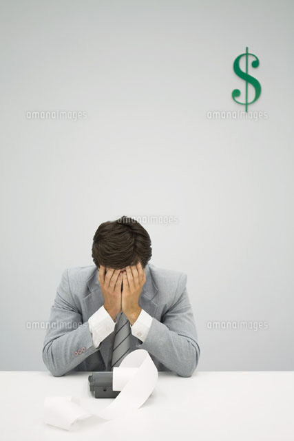 Accountant sitting with adding machine
(c)Ale Ventura/PhotoAlto