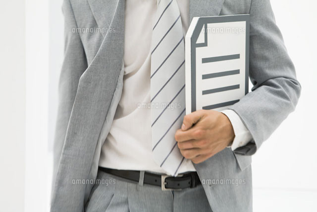 Businessman carrying document of mid section
(c)Ale Ventura/PhotoAlto