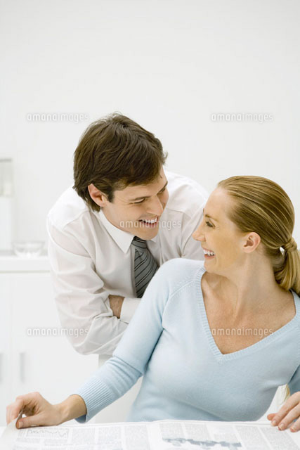 Couple smiling at each other,
(c)Sigrid Olsson/PhotoAlto