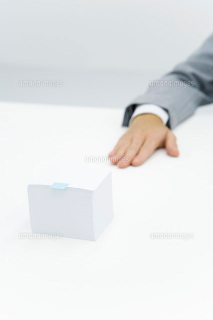 Stack of paper with small adhesive note stuck on it
(c)Alix Minde/PhotoAlto