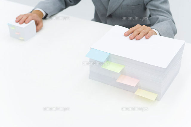 Stacks of paper with adhesive notes dividing them
(c)Alix Minde/PhotoAlto