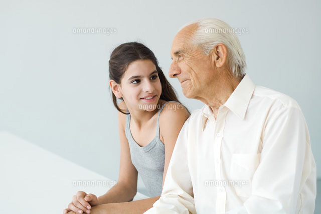 Teenage girl looking at grandfather, man looking away
(c)Eric Audras/PhotoAlto