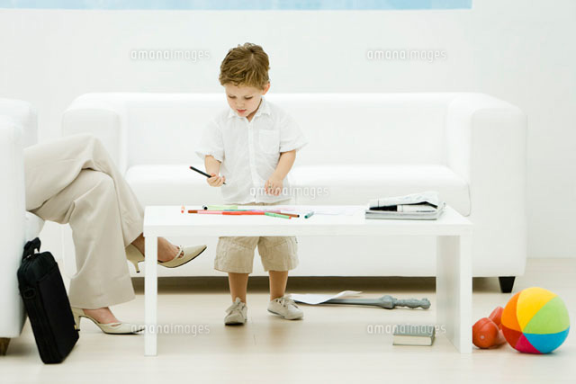 Professional woman and son in waiting room, boy coloring
(c)Alix Minde/PhotoAlto