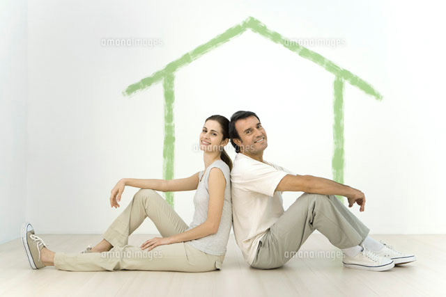 Couple sitting back to back in front of an outline
(c)Alix Minde/PhotoAlto