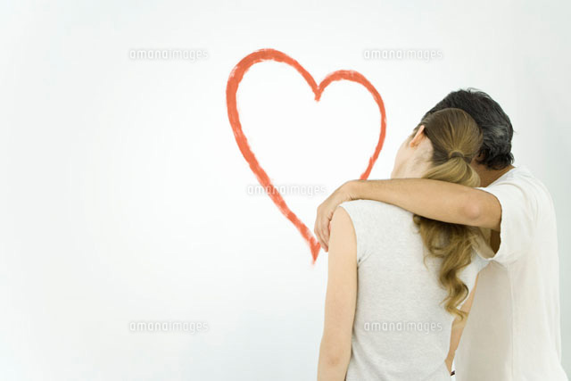 Rear view of couple standing
(c)Alix Minde/PhotoAlto