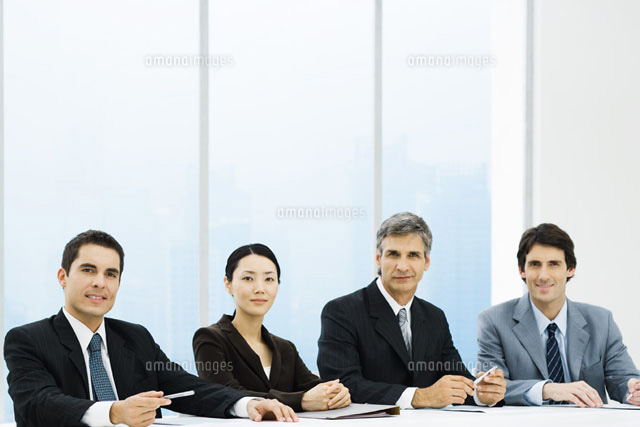 Business associates sitting at meeting table
(c)Frederic Cirou/PhotoAlto