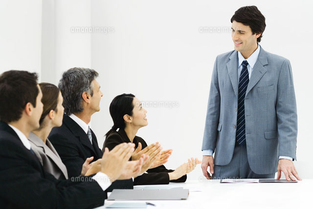 Group of business associates applauding colleague
(c)Frederic Cirou/PhotoAlto