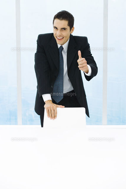 Businessman leaning on back of chair
(c)Frederic Cirou/PhotoAlto