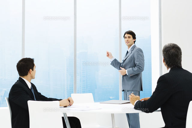 Businessmen in meeting,one standing,pointing out window
(c)Frederic Cirou/PhotoAlto