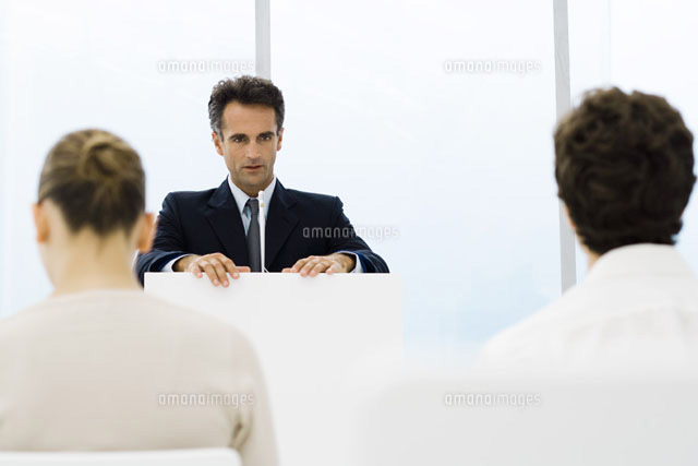Businessman speaking from lectern
(c)Frederic Cirou/PhotoAlto