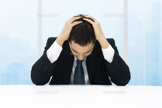 Businessman holding head
(c)Frederic Cirou/PhotoAlto