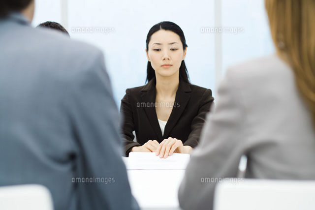 Executives in meeting,focus on woman holding document
(c)Frederic Cirou/PhotoAlto