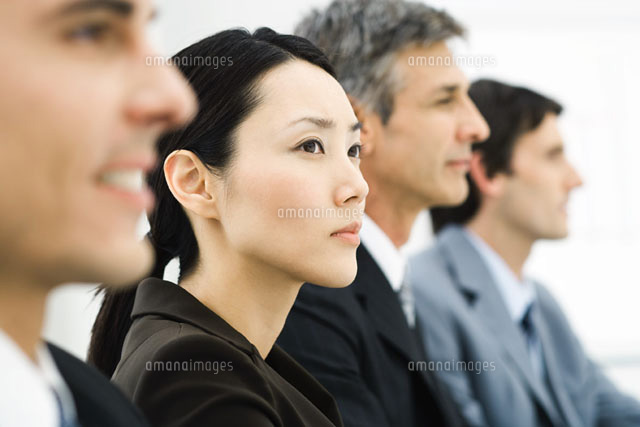 Row of business executives,focus on woman in middle ground
(c)Frederic Cirou/PhotoAlto