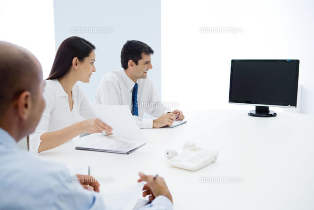 Group of executives having teleconference
(c)Sigrid Olsson/PhotoAlto