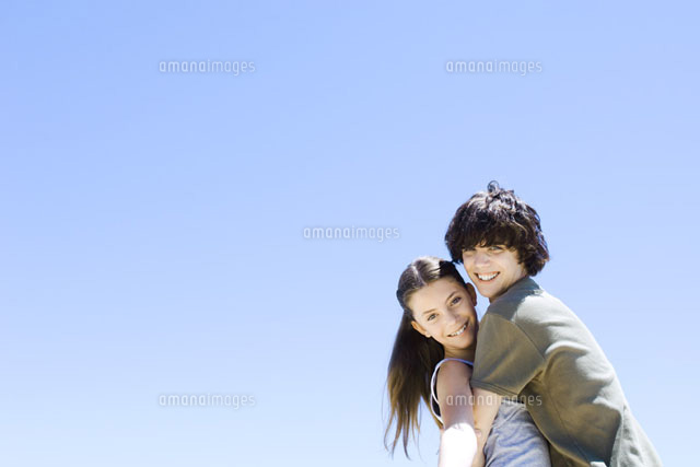 Brother hugging his sister,smiling at camera
(c)Michele Constantini/PhotoAlto