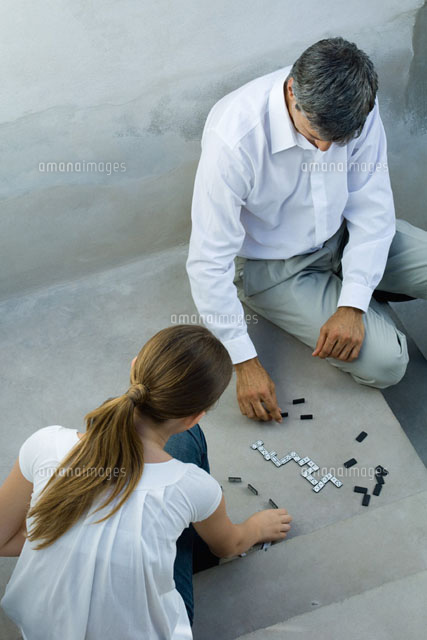 Father and daughter playing dominoes
(c)Michele Constantini/PhotoAlto