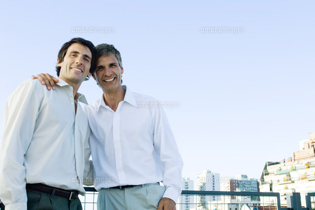 Man with his arm around another man
(c)Michele Constantini/PhotoAlto
