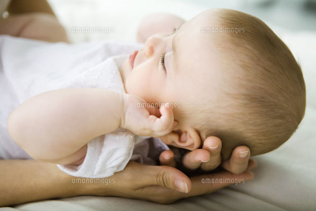 Infant lying on mother’s hands,cropped
(c)Ale Ventura/PhotoAlto