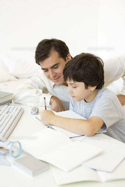 Father helping son with his homework
(c)Sigrid Olsson/PhotoAlto