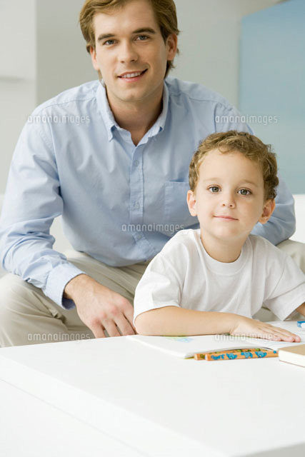 Father and son sitting together with book
(c)Sigrid Olsson/PhotoAlto