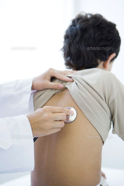 Doctor placing stethoscope on boy’s back,cropped view
(c)Alix Minde/PhotoAlto