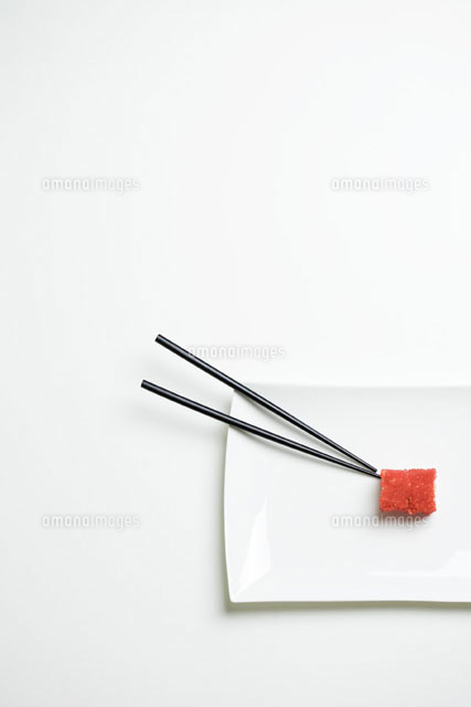 Maki sushi and chopsticks on sushi plate,overhead view
(c)Ale Ventura/PhotoAlto