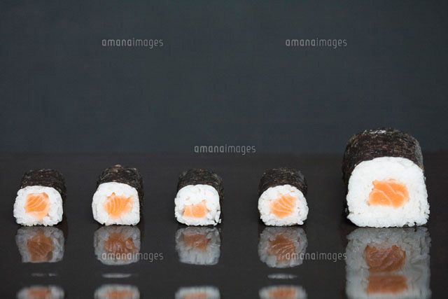 Maki sushi in a row,one piece larger than the others
(c)Ale Ventura/PhotoAlto