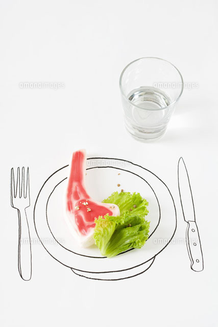 Plastic steak and lettuce on drawing of plate
(c)Laurence Mouton/PhotoAlto