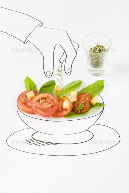 Drawing of hand sprinkling seasonings on salad
(c)Laurence Mouton/PhotoAlto