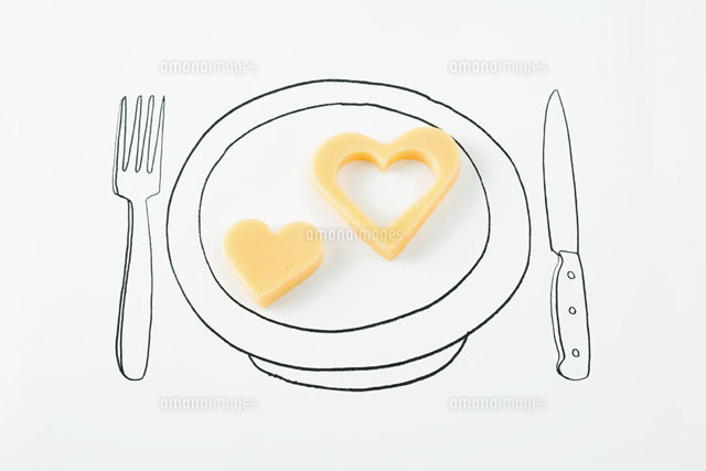 Heart-shaped cheese on drawing of plate
(c)Laurence Mouton/PhotoAlto